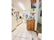 Kitchen with wood cabinets and a mix of appliances at 156 Lakewood Village Cir # 156, Daytona Beach, FL 32119