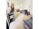 Spacious living room with light carpeting and comfy seating at 156 Lakewood Village Cir # 156, Daytona Beach, FL 32119