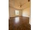 Large bedroom with light walls, ceiling fan, and a window offering natural light at 1823 Natchez Trace Blvd, Orlando, FL 32818
