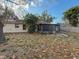 Shot of the backyard and included screened in porch at 1823 Natchez Trace Blvd, Orlando, FL 32818