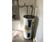 Close up of a Whirlpool branded electric water heater in a utility area at 1823 Natchez Trace Blvd, Orlando, FL 32818