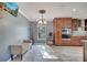 Dining area features tile floors, neutral walls and traditional lighting fixture at 212 Rontunda Dr, Kissimmee, FL 34758