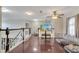 A loft with hardwood floors and an animal kennel sits in a spacious home at 212 Rontunda Dr, Kissimmee, FL 34758