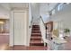 Staircase has an electric chair lift and wood steps at 212 Rontunda Dr, Kissimmee, FL 34758