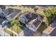 Two-story house with solar panels and a landscaped yard at 2136 Laurel Blossom Cir, Ocoee, FL 34761