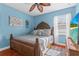 Spacious bedroom with large bed and TV at 2136 Laurel Blossom Cir, Ocoee, FL 34761