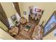 Living room with hardwood floors, ornate furniture, and high ceilings at 2136 Laurel Blossom Cir, Ocoee, FL 34761