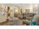 Spacious living room with comfortable seating and open floor plan at 2136 Laurel Blossom Cir, Ocoee, FL 34761