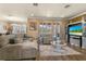 Open living room with sectional sofa, and view of pool at 2136 Laurel Blossom Cir, Ocoee, FL 34761