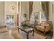 Elegant living room with high ceilings and ample natural light at 2136 Laurel Blossom Cir, Ocoee, FL 34761