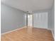 Spacious bedroom with wood floors and large closet at 2223 Silver Pines Pl # 501, Orlando, FL 32808