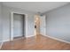 Bright bedroom with wood floors and a spacious closet at 2223 Silver Pines Pl # 501, Orlando, FL 32808
