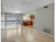 Open concept living and kitchen area with tile floors at 2223 Silver Pines Pl # 501, Orlando, FL 32808