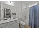 Bathroom with a tub, shower, and single vanity at 2612 Yountville Ave, Kissimmee, FL 34741