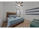 Bedroom with a king bed and ceiling fan at 2612 Yountville Ave, Kissimmee, FL 34741