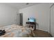 Bedroom with a TV and dresser, offering additional comfort at 2612 Yountville Ave, Kissimmee, FL 34741