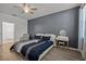 Bedroom with a queen bed, built-in vanity, and access to bathroom at 2612 Yountville Ave, Kissimmee, FL 34741