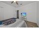 Comfortable bedroom with TV and access to another room at 2612 Yountville Ave, Kissimmee, FL 34741