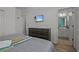 Bedroom with a king-size bed and ensuite bathroom access at 2612 Yountville Ave, Kissimmee, FL 34741