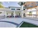Community center patio with orange and blue seating at 2612 Yountville Ave, Kissimmee, FL 34741