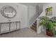 Entryway with stylish console table and staircase at 2612 Yountville Ave, Kissimmee, FL 34741