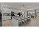 Modern kitchen with granite countertops and stainless steel appliances at 2612 Yountville Ave, Kissimmee, FL 34741