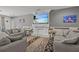 Spacious living room featuring a fireplace and comfortable seating at 2612 Yountville Ave, Kissimmee, FL 34741