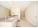 Elegant bathroom with double vanity, large mirror and walk-in shower at 2746 Bookmark Dr, Kissimmee, FL 34746