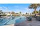 Resort-style pool with lounge chairs and patio area at 2746 Bookmark Dr, Kissimmee, FL 34746