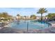 Relaxing kidney-shaped pool with surrounding patio at 2746 Bookmark Dr, Kissimmee, FL 34746