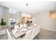 Bright dining room with a large table and chandelier at 2746 Bookmark Dr, Kissimmee, FL 34746