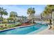 Relaxing lazy river water feature with wooden bridge at 2746 Bookmark Dr, Kissimmee, FL 34746