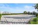 Outdoor sand volleyball court with surrounding landscaping at 2746 Bookmark Dr, Kissimmee, FL 34746