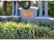 Sunset Lake Condominium entrance sign with festive holiday wreath at 4332 S Kirkman Rd # 1013, Orlando, FL 32811