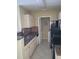 Kitchen with granite countertops and stainless steel appliances at 4332 S Kirkman Rd # 1013, Orlando, FL 32811