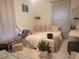 Bright bedroom featuring modern decor, neutral tones, and cozy accents at 4749 Hopespring Dr, Orlando, FL 32829
