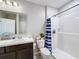 Bathroom with single vanity, shower, and tiled floor at 583 Taft Dr, Davenport, FL 33837