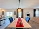 Bright dining area with marble table and modern chandelier at 583 Taft Dr, Davenport, FL 33837
