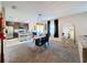 Elegant dining room with a marble table and chandelier at 583 Taft Dr, Davenport, FL 33837