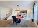 Modern dining room adjacent to kitchen and staircase at 583 Taft Dr, Davenport, FL 33837