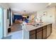 Island kitchen with granite countertops and stainless steel appliances at 583 Taft Dr, Davenport, FL 33837
