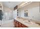 Double vanity bathroom with a shower/tub combo at 7137 Harmony Square Dr # 31A, Harmony, FL 34773