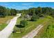 Aerial view of a community garden with a gazebo and well-maintained grounds at 7137 Harmony Square Dr # 31A, Harmony, FL 34773