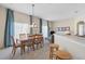 Dining room with table, chairs, and access to balcony at 7137 Harmony Square Dr # 31A, Harmony, FL 34773