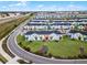 Aerial view of vibrant townhomes, community, and landscaping at 8178 Coconut Pl, Kissimmee, FL 34747