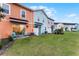 Community backyard with colorful homes at 8178 Coconut Pl, Kissimmee, FL 34747