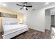 Main bedroom with ceiling fan and large window at 8178 Coconut Pl, Kissimmee, FL 34747