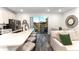 Modern kitchen with island, stainless steel appliances, and access to backyard at 8178 Coconut Pl, Kissimmee, FL 34747