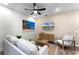 Bright and airy living room featuring a neutral color scheme and comfortable seating at 8178 Coconut Pl, Kissimmee, FL 34747