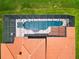 Bird's eye view of a home with a screened pool at 880 Spinnaker Way, Kissimmee, FL 34746